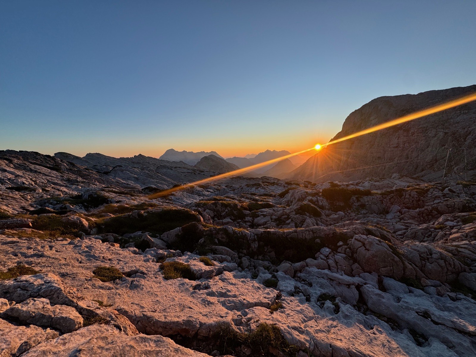 Sunrise over the Steinernes Meer, the light raking across the limestone plateau
